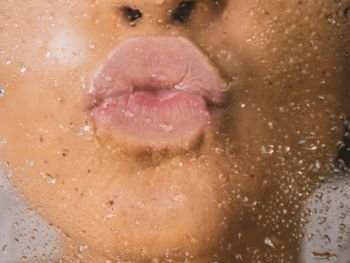 woman in water with water droplets